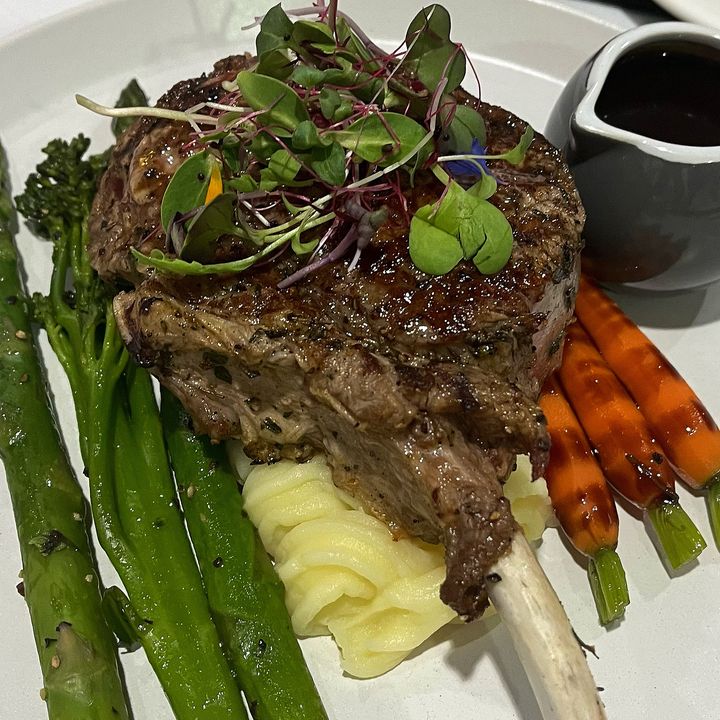 Featured image for “Our 350g bone in rib eye steak served with truffle mash, honey roasted baby carrot and broccolini topped with red wine jus and salsa verde is not to be missed!  $40 / $42  #wp”